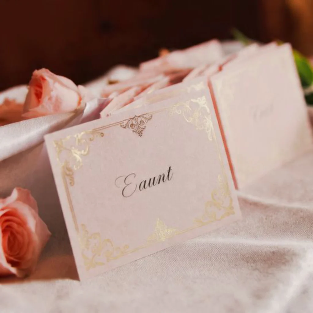 Integrate Pink Gold Wedding in the Escort Cards