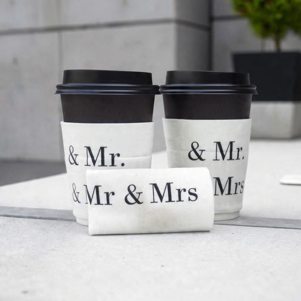 a lifestyle photograph of reusable coffee sleeves