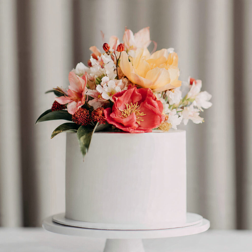 a minimalist wedding cake with a clean