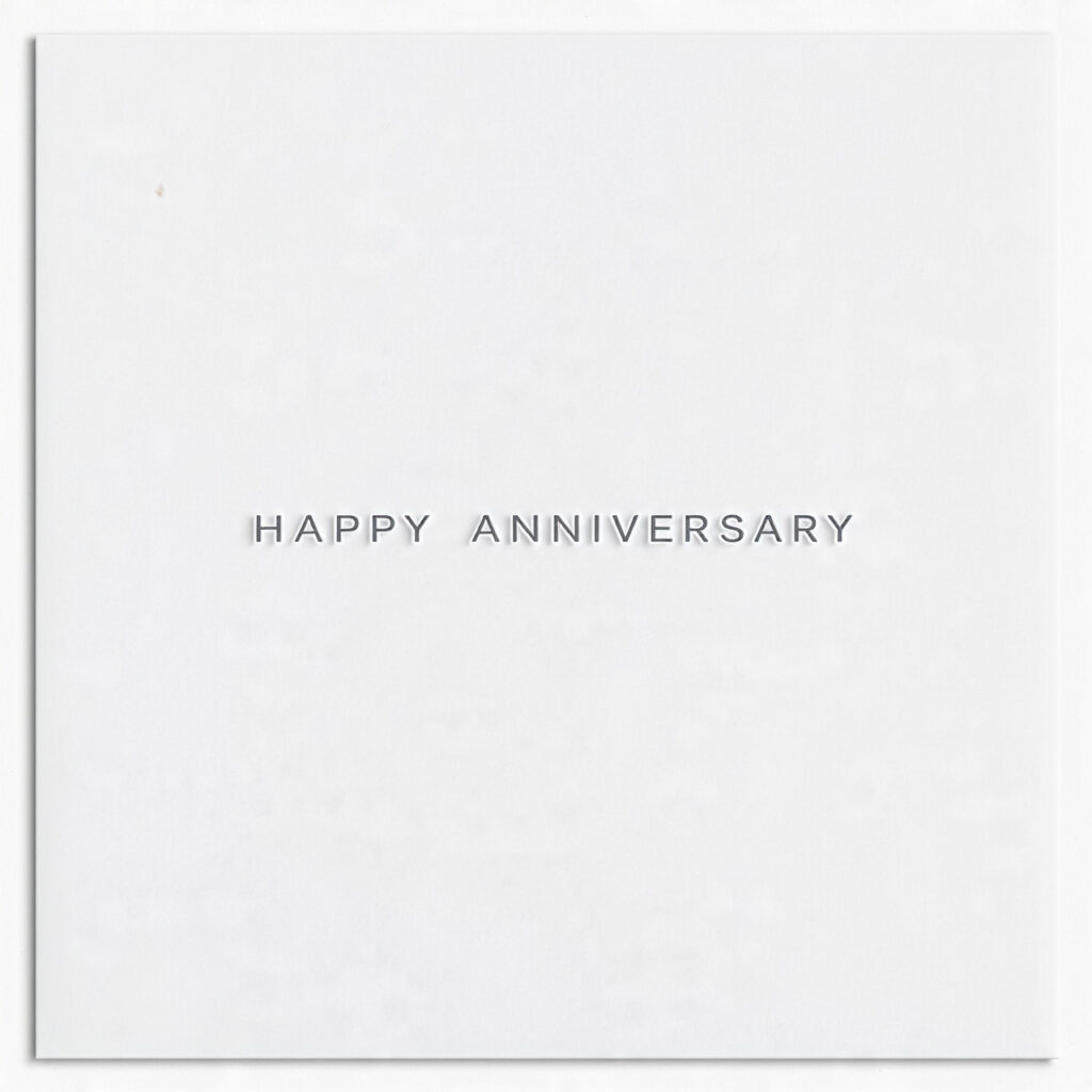 minimalist white anniversary card with one short